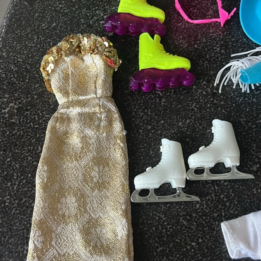 Vintage 1990s Barbie doll bundle of accessories. Gown, rodeo, Baywatch, skater.